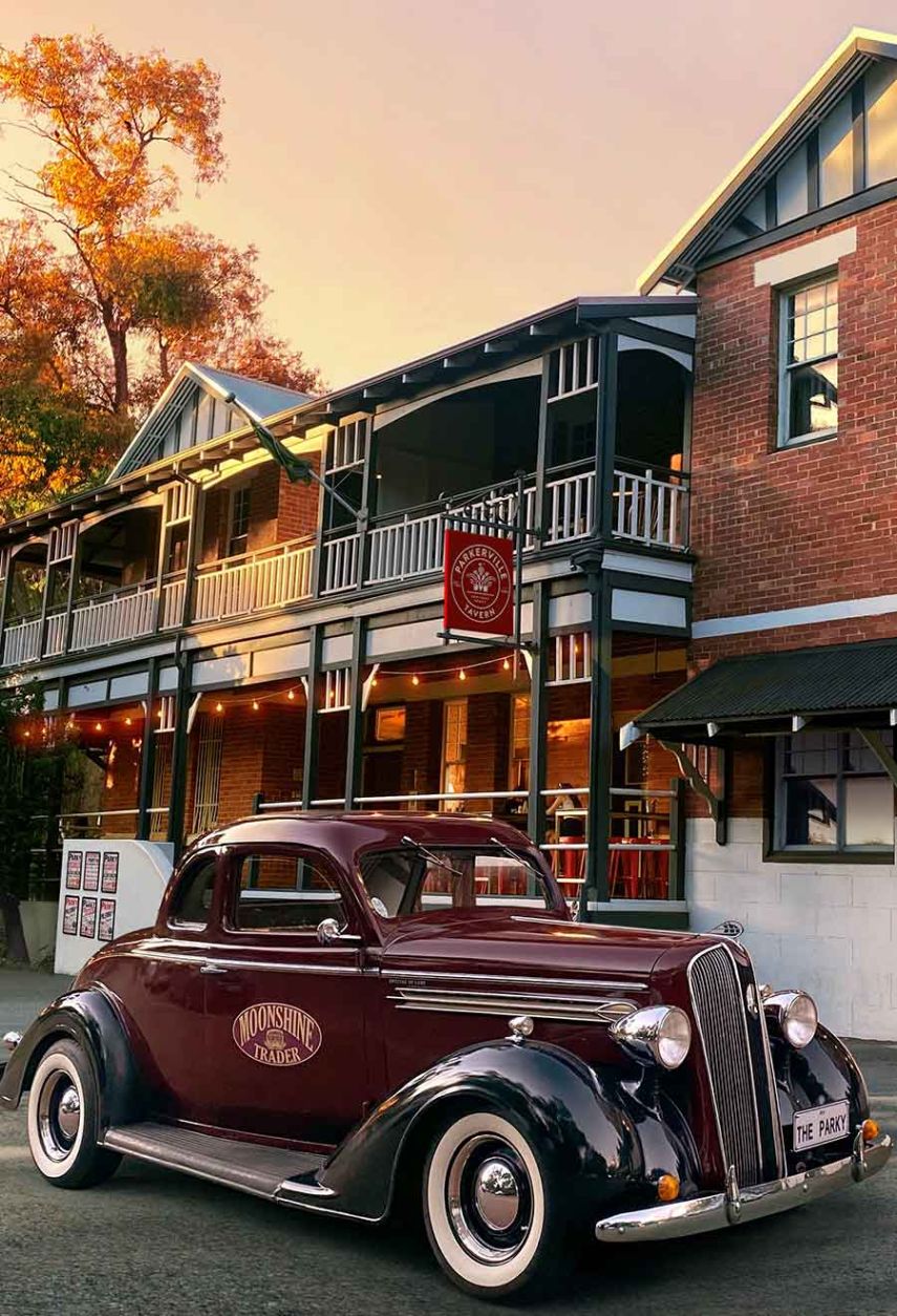 Parkerville Tavern heritage listed hotel is a two storey building with a wrap around veranda and large shady beer garden